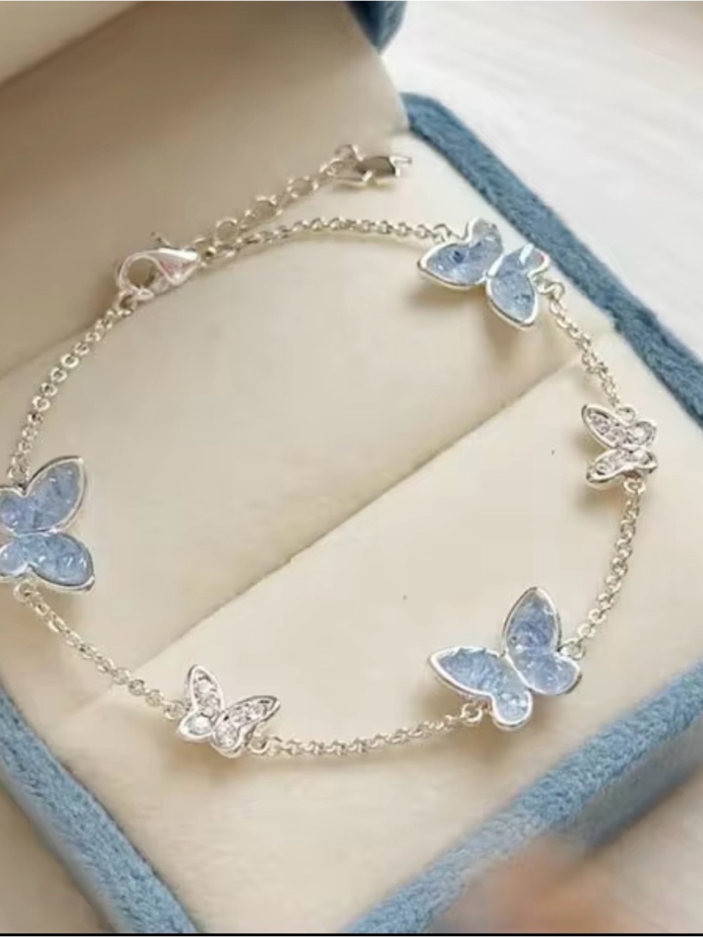 Delicate Silver Butterfly Bracelet with Light Blue Accents new